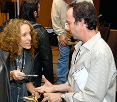 Music Supervisor Jonathan Weiss taking music from a TAXI member after his panel at the Road Rally.