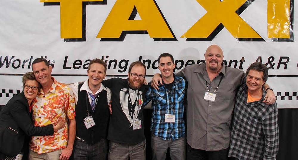 The Collaboration Nation panelists enjoy a little group bonding after their panel. It's pretty apparent how strong TAXI's community is in this photo. (Left to Right) C.K. Barlow, Russell Landwehr, Matt Vander Boegh, Steven Guiles, Seth Littlefield, Scott Free, and TAXI's Michael Laskow 