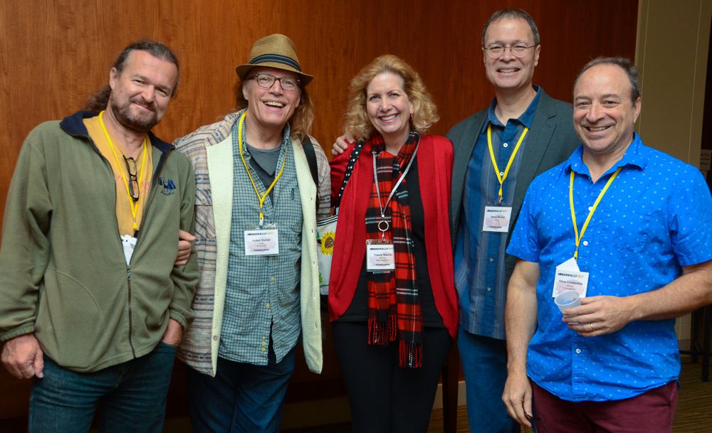 Successful composers and long-time friends Matt Hirt, Volker Barber, Tracey and Vance Marino, and Vince Constantino take a moment to grab a photo at TAXI’s 2017 Road Rally.