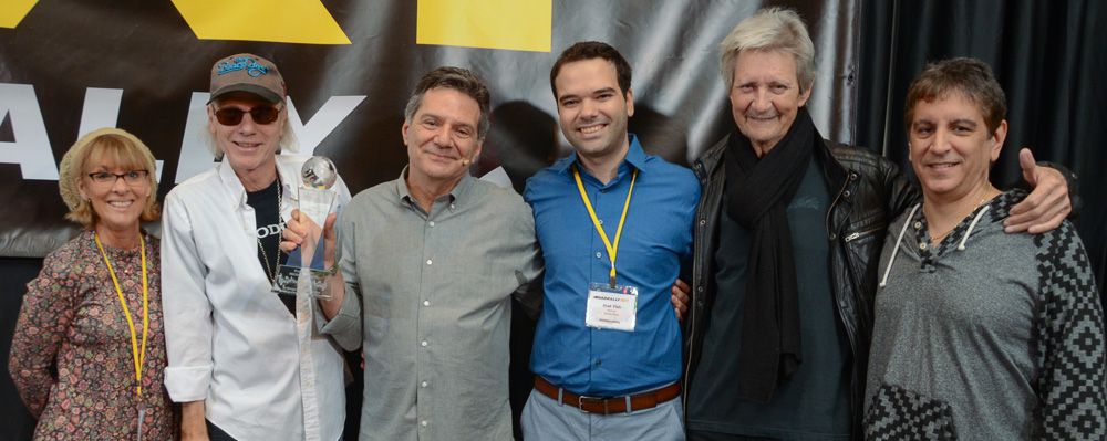 AXI CEO Michael Laskow (3rd from left) was presented with a surprise Members’ Choice Award. He’s joined here by his wife Debra Laskow, and his closest friends: Legendary Record Producer Michael Lloyd; Hit Songwriter and Producer Ralph Murphy, Studio Pros, CEO Elad Fish, and Multi-Platinum Mixer/Producer and Rob Chiarelli.