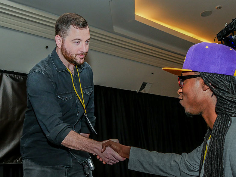 Music supervisor Naaman Snell looks like he’s ready to ask a TAXI member where he got his awesome Laker hat. 