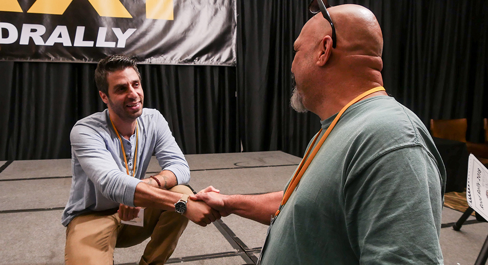 Music Supervisor Frank Palazzolo does a little post panel meet and greet with TAXI member Scott Free at TAXI’s Road Rally, 2019.