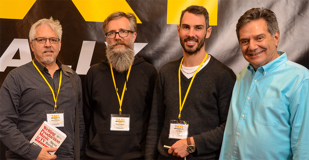 Panelists (left to right) Steve Barden, Karl Richter, and Tim Bern are joined on stage for a quick post-panel shot with TAXI’s Michael Laskow.