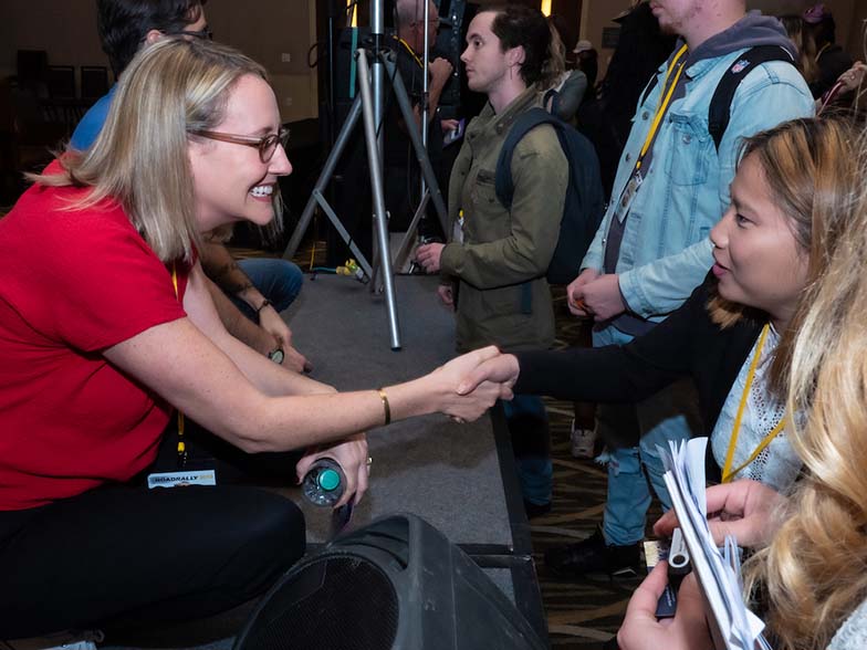 Music Licensing Executive, Shannon Quisenberry takes time to chat with a TAXI member after finishing up the Film & TV Song Pitch and Feedback Panel at TAXI’s Road Rally.