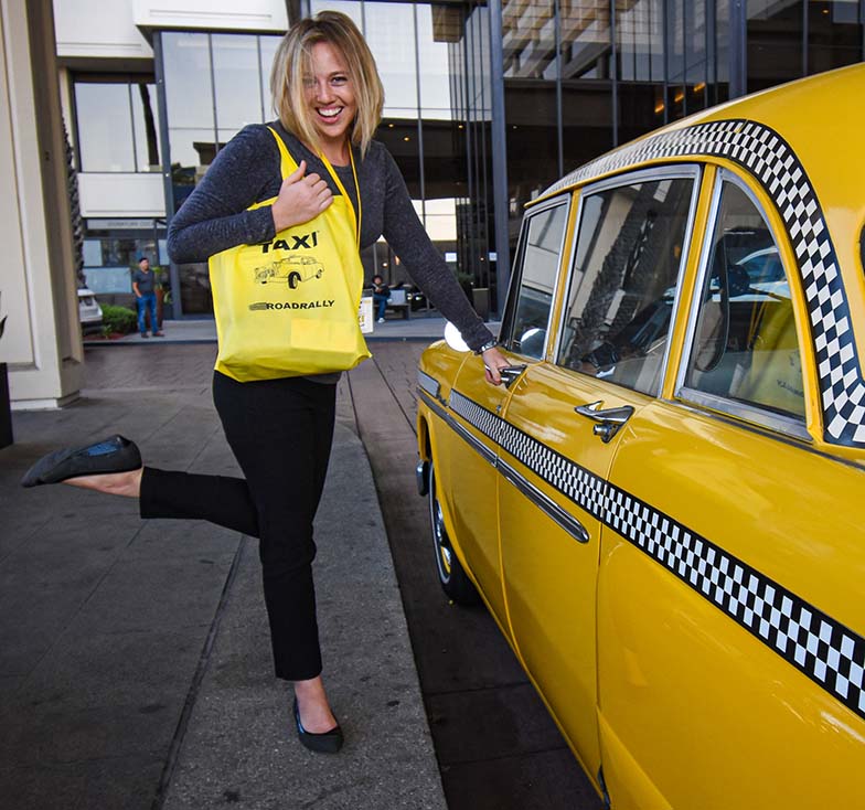 Road Rally attendees love to check out our vintage, 1968 Checker cab mascot. We wish we knew this member’s name, but alas, we don’t! But hey, thanks for letting our photographer convince you to pose with our 3,390-pound beast!