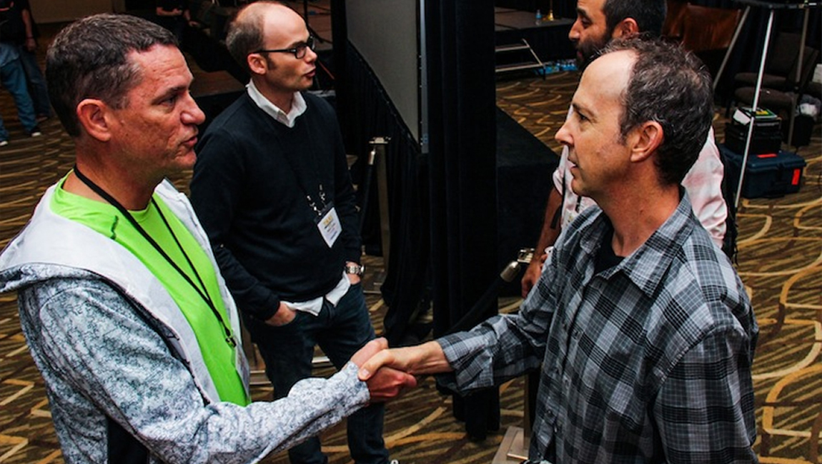 TAXI member Russell Landwehr (left) meets Music Supervisor Jonathan Weiss in the foreground during a recent TAXI Road Rally convention!