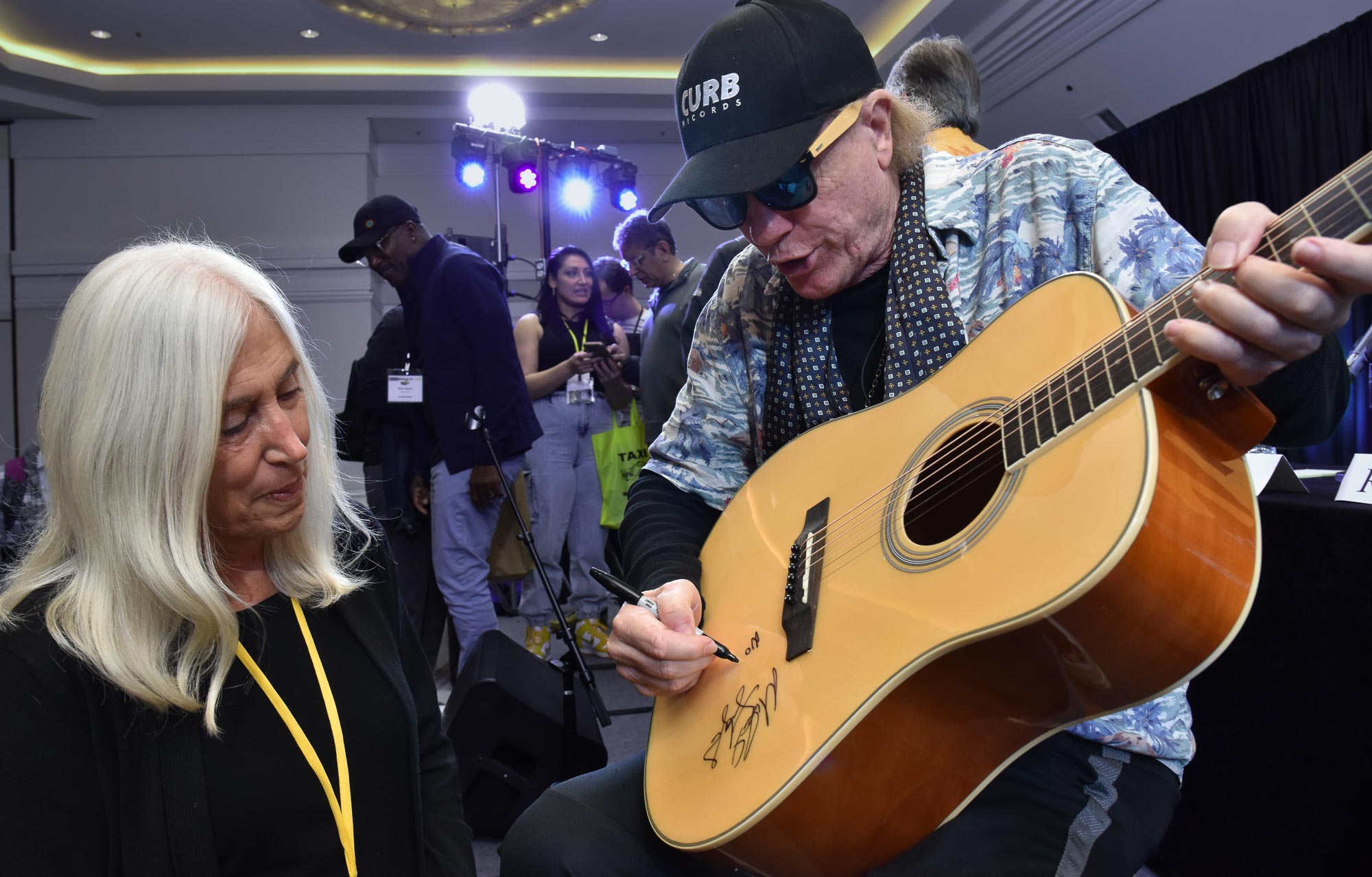 Producer, Michael Lloyd has more than 100 gold and platinum records to his credit, yet he remains the kind of person who donates a guitar as a prize every year — and even autographs it when the lucky winner asks him to!