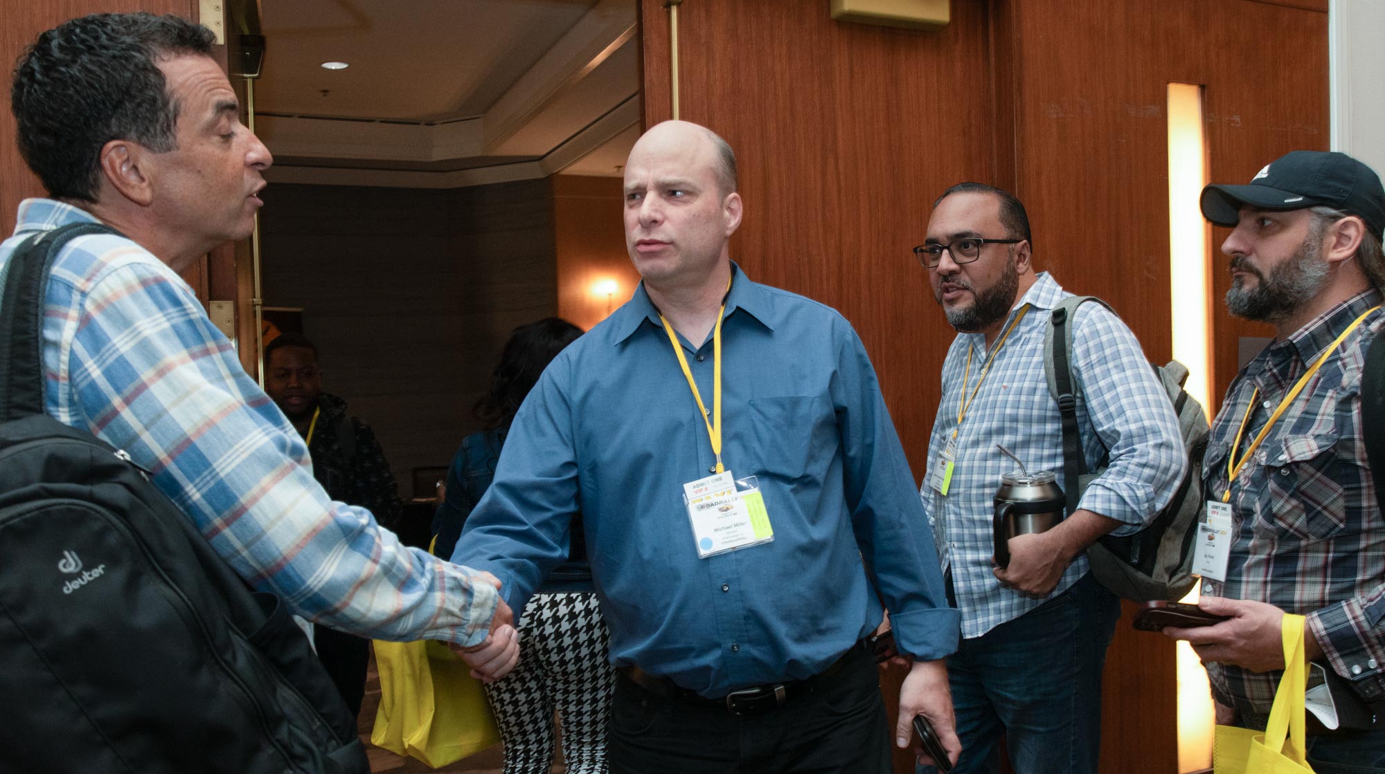 Music Supervisor Nick Haussling chatting with a group of TAXI members after his presentation.