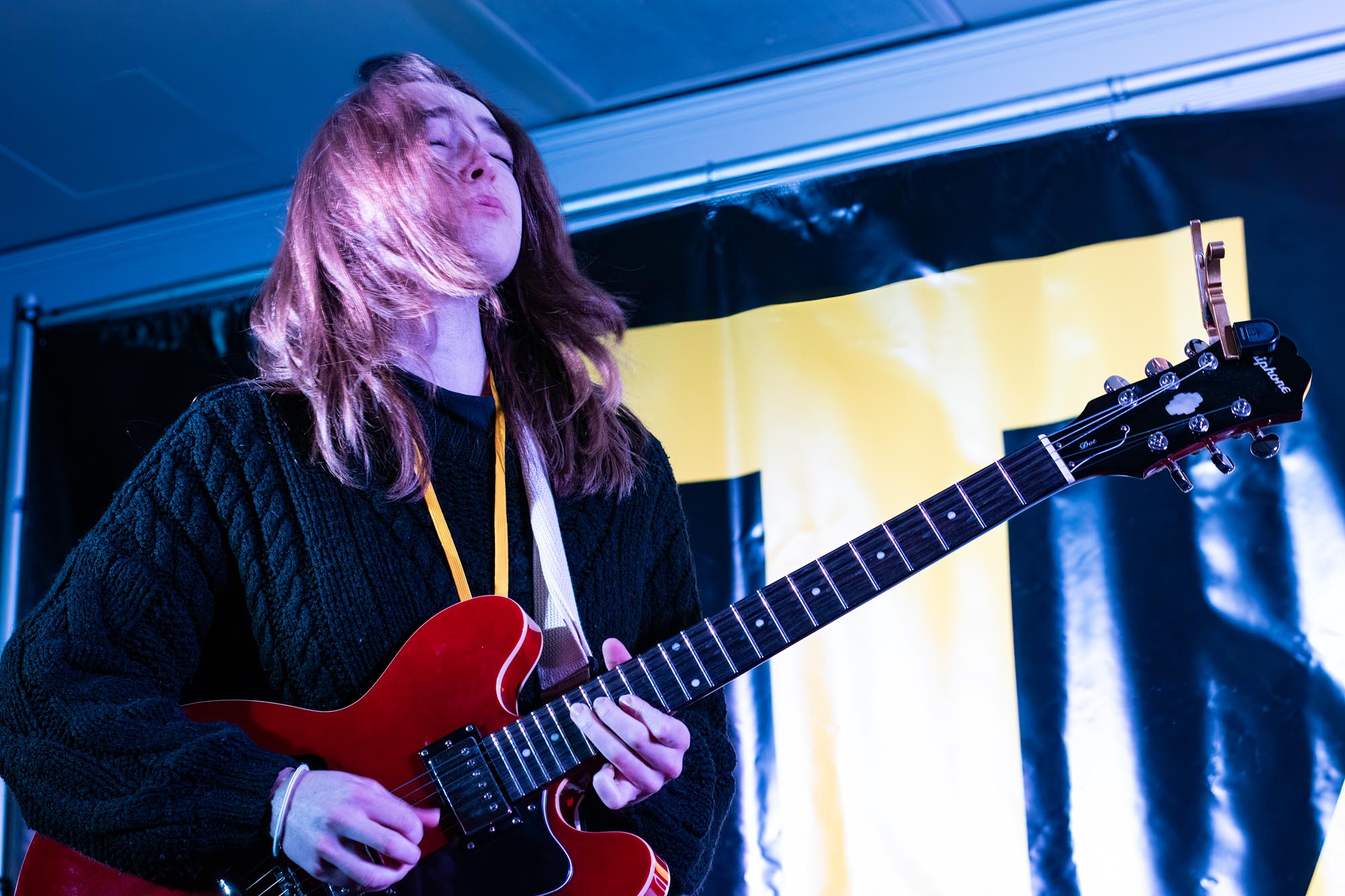 We couldn’t find a shot in which we could see this young lady’s name on her badge, but she caused quite a stir with her great blues guitar playing. Nice going!