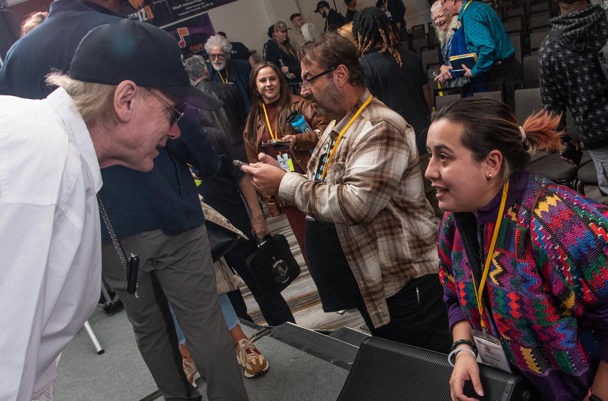 Legendary producer Michael Lloyd took a moment to chat with a TAXI member at the end of the Road Rally.