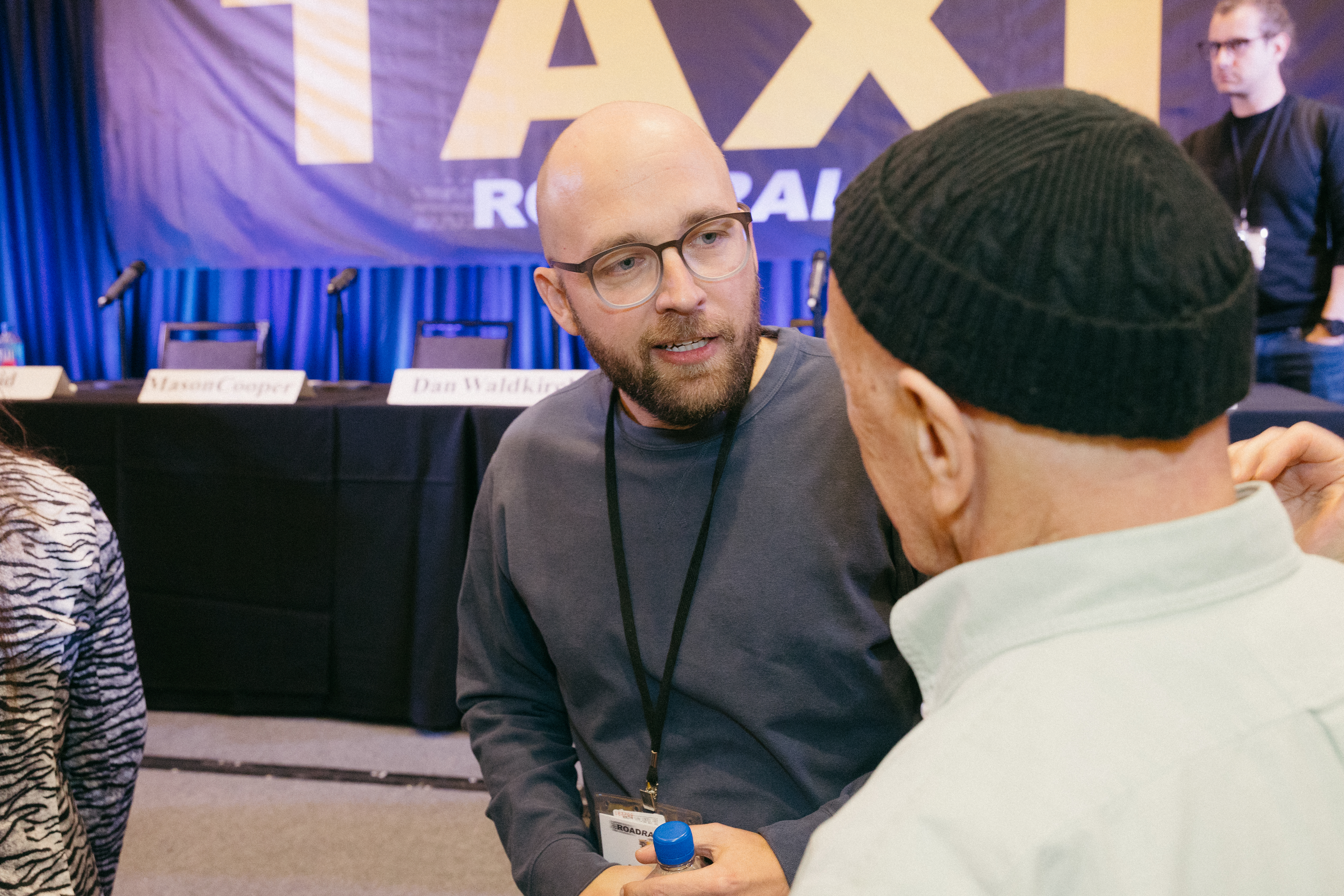 Music Licensing Executive Dan Waldkirch (l) chatting with long-time TAXI member Bill Gordon.