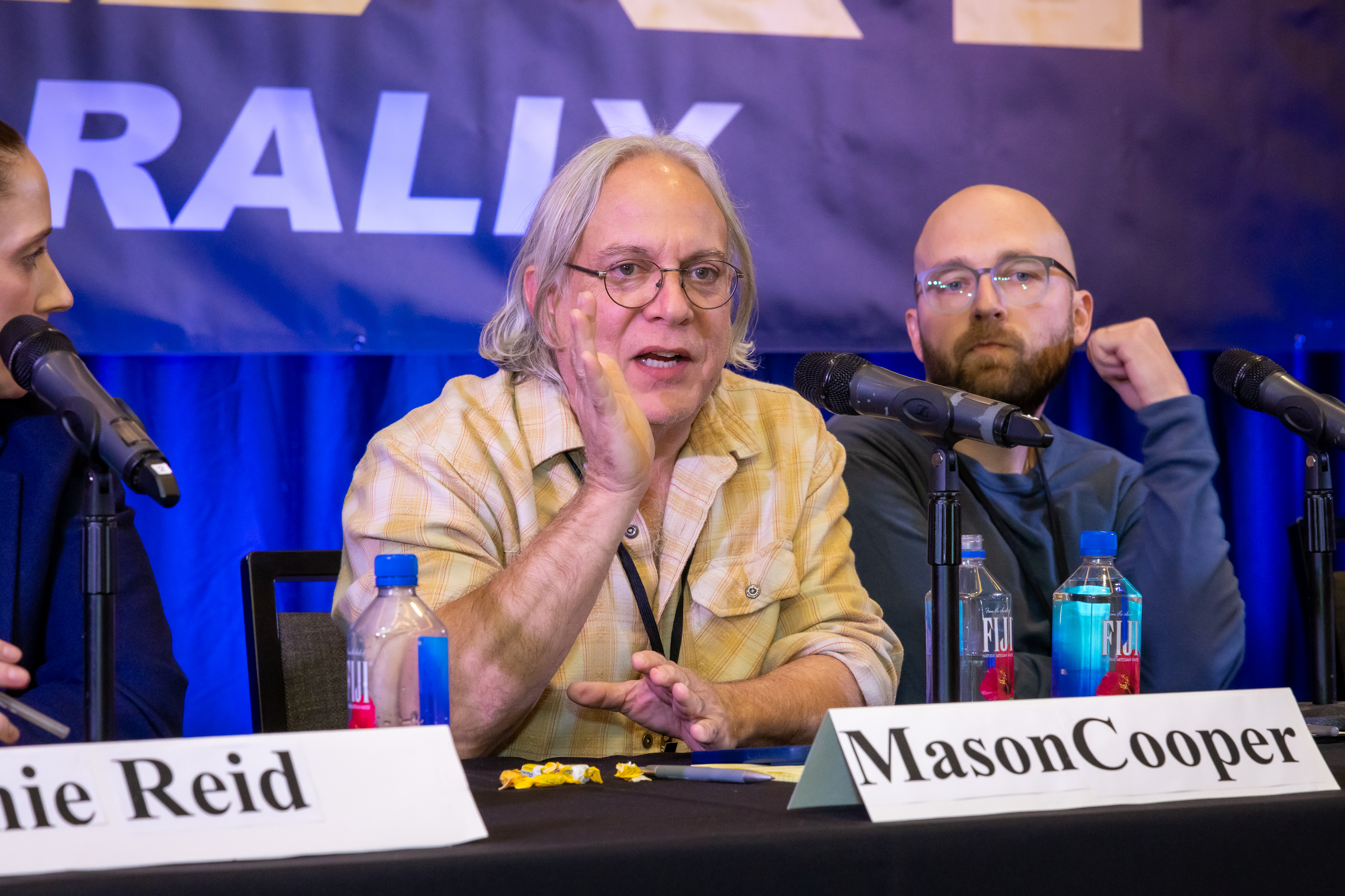 Music Supervisor Mason Cooper goes one-on-one, giving feedback from the stage to a TAXI member seated in the audience.